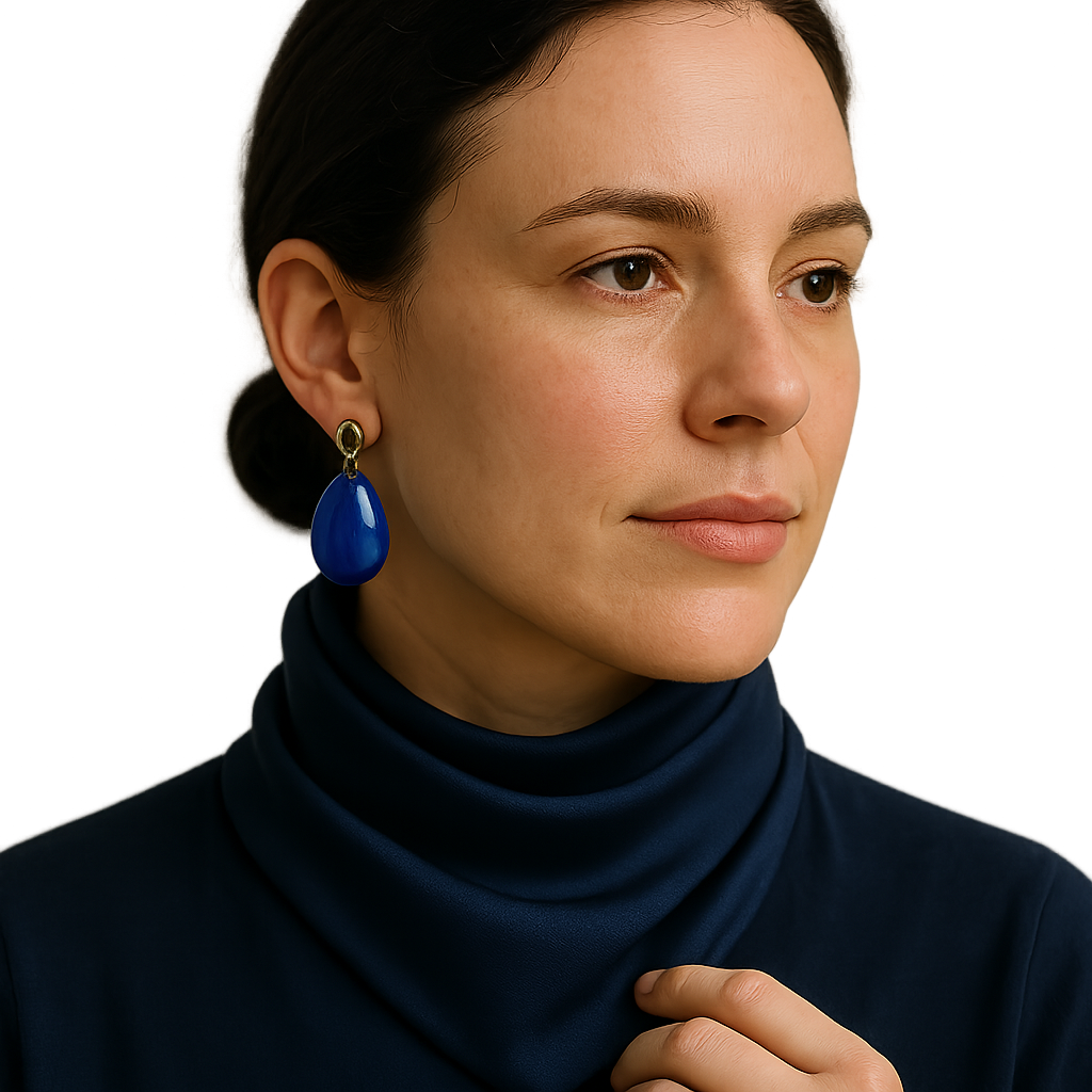Navy near your face makes bright jewelry behave